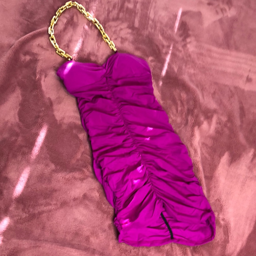 Fuchsia dress with gold chain halter.